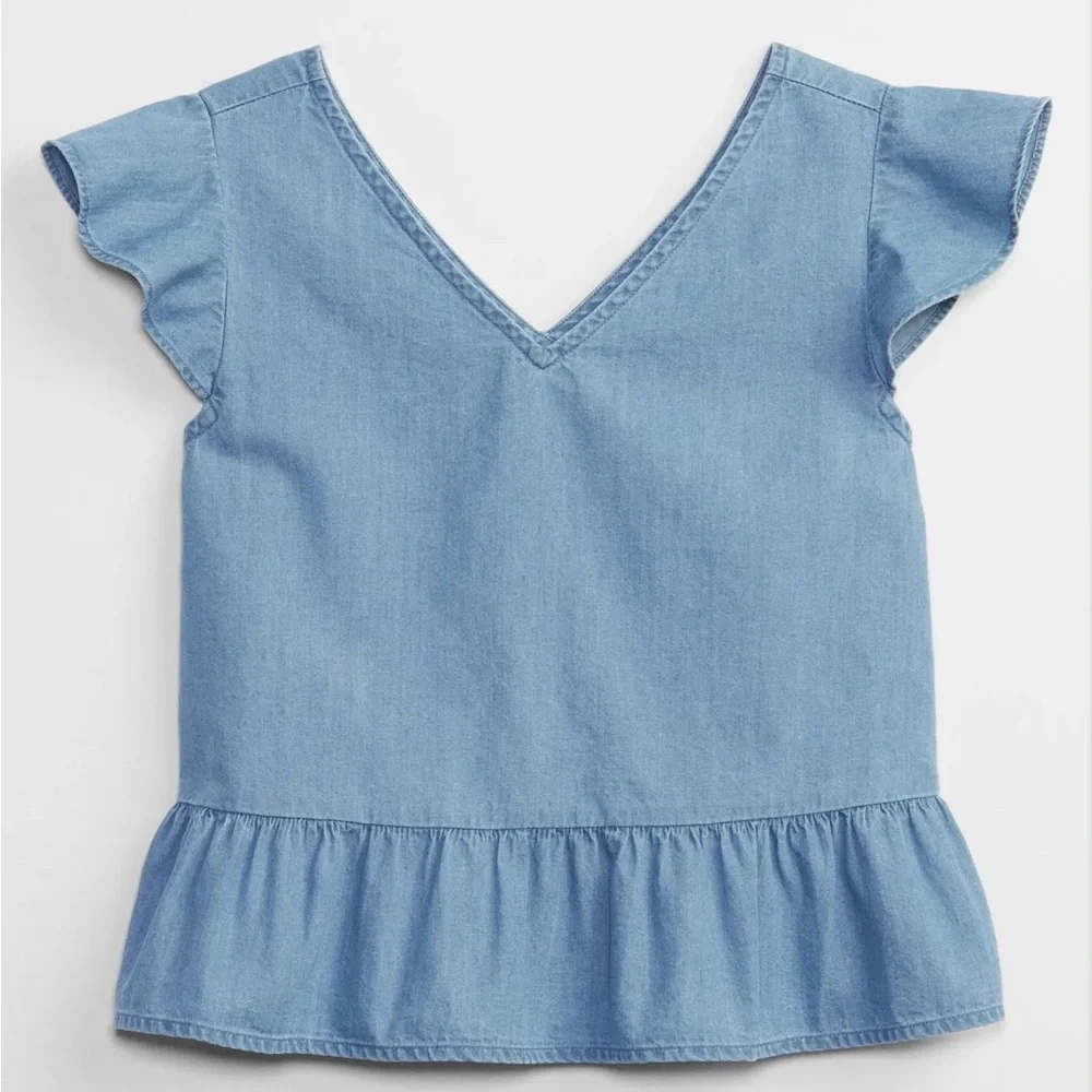Gap - children's top is made of light-wash blue denim cotton.